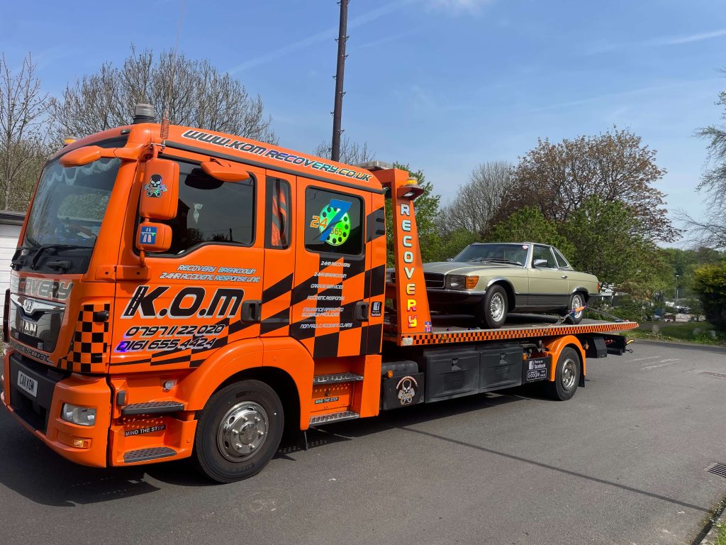 K.O.M flatbed recovery truck on a vehicle collection