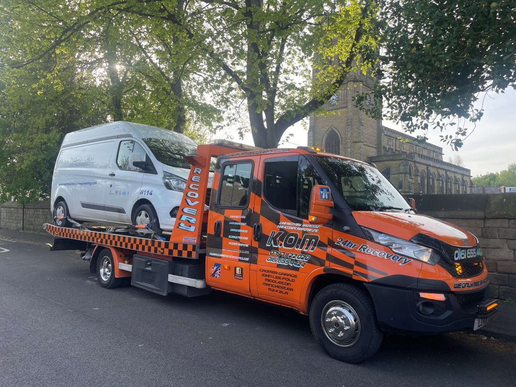K.O.M vehicle transporter with a van on board