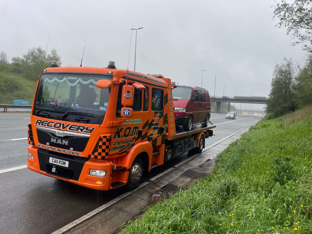 K.O.M recovery truck on the road